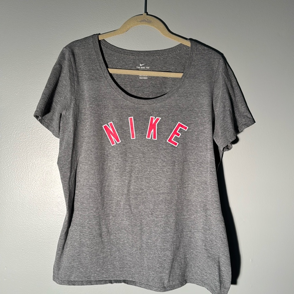 Nike ladies fit, size XL T-shirt. Gray with white outlined hot pink lettering.